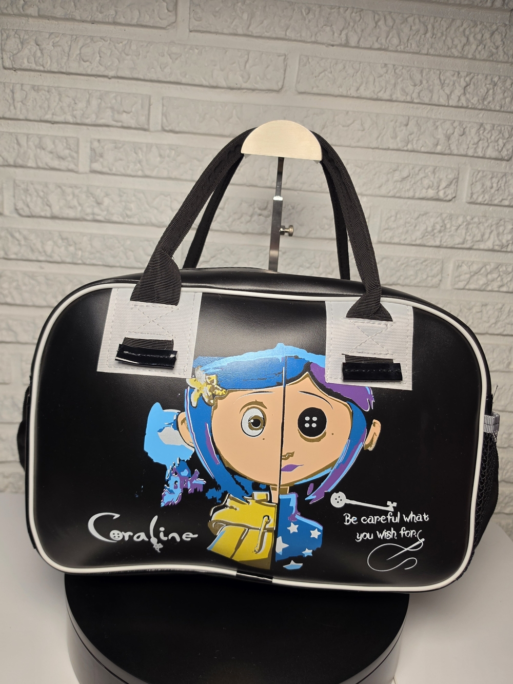 New Coraline Black Travel Bag with Cartoon Graphic